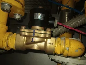 Sistema de pretratamiento de gases para el tejido textil